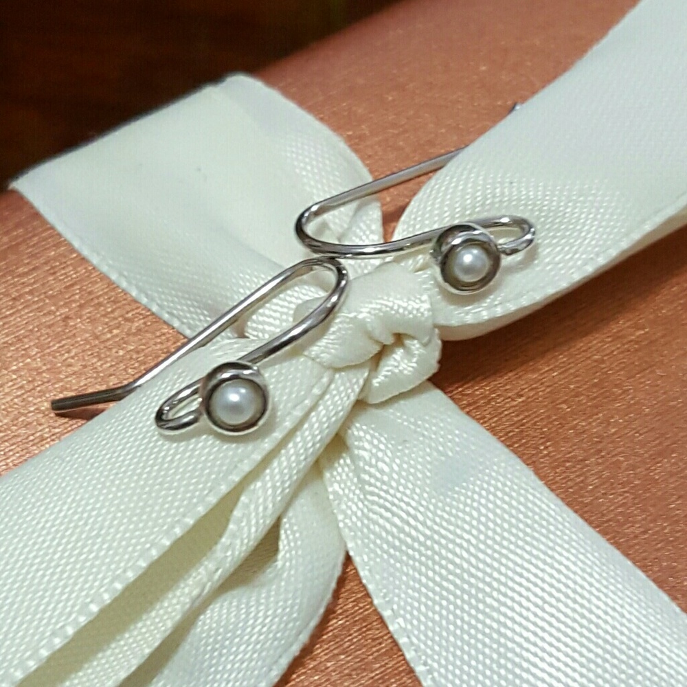 Authentic Pandora post earrings with pearl